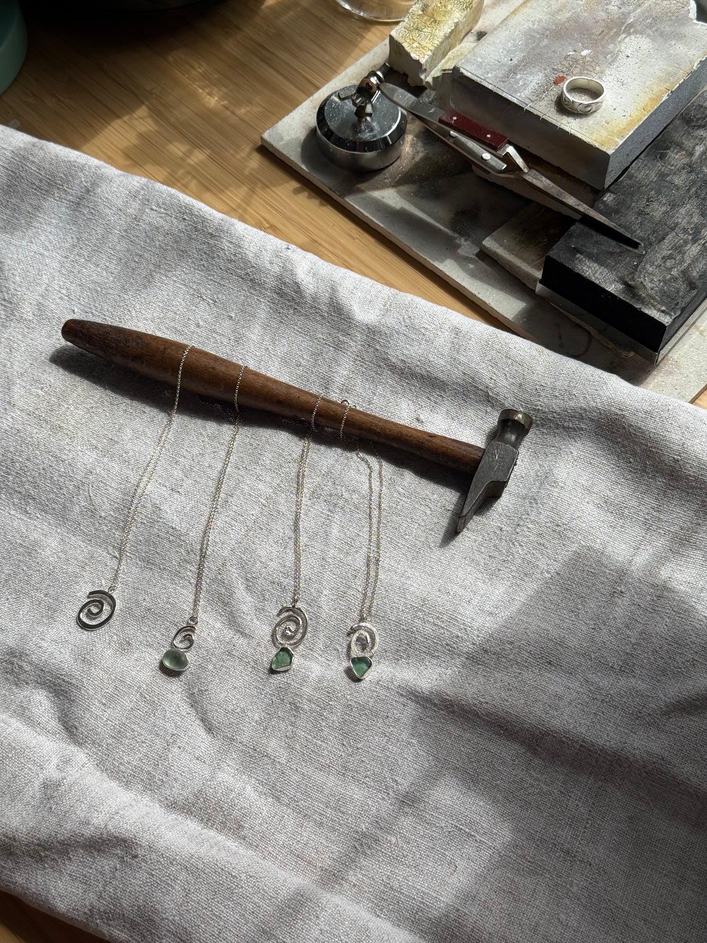 tide spiral pendant