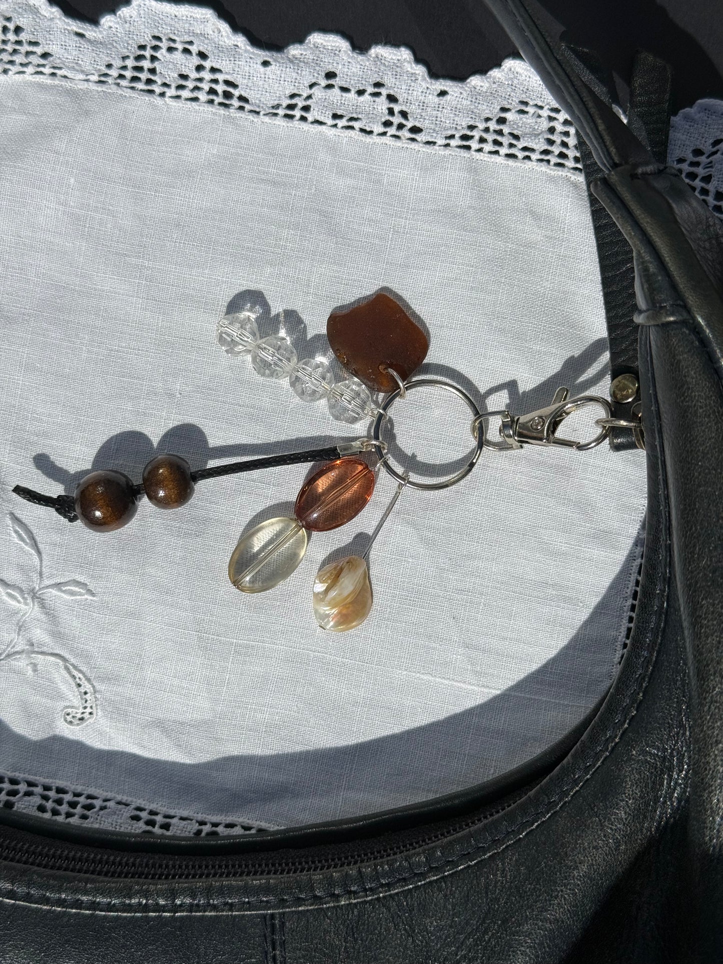 Keychain with beads on a textured surface