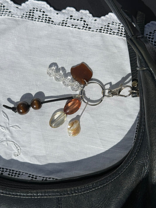 Keychain with beads on a textured surface