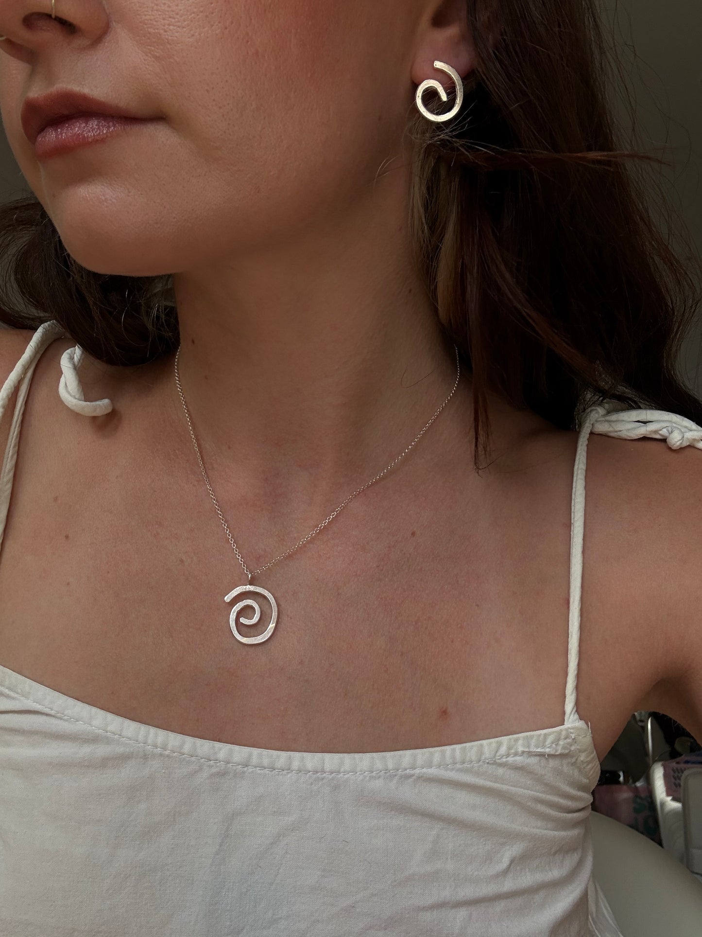 statement spiral studs
