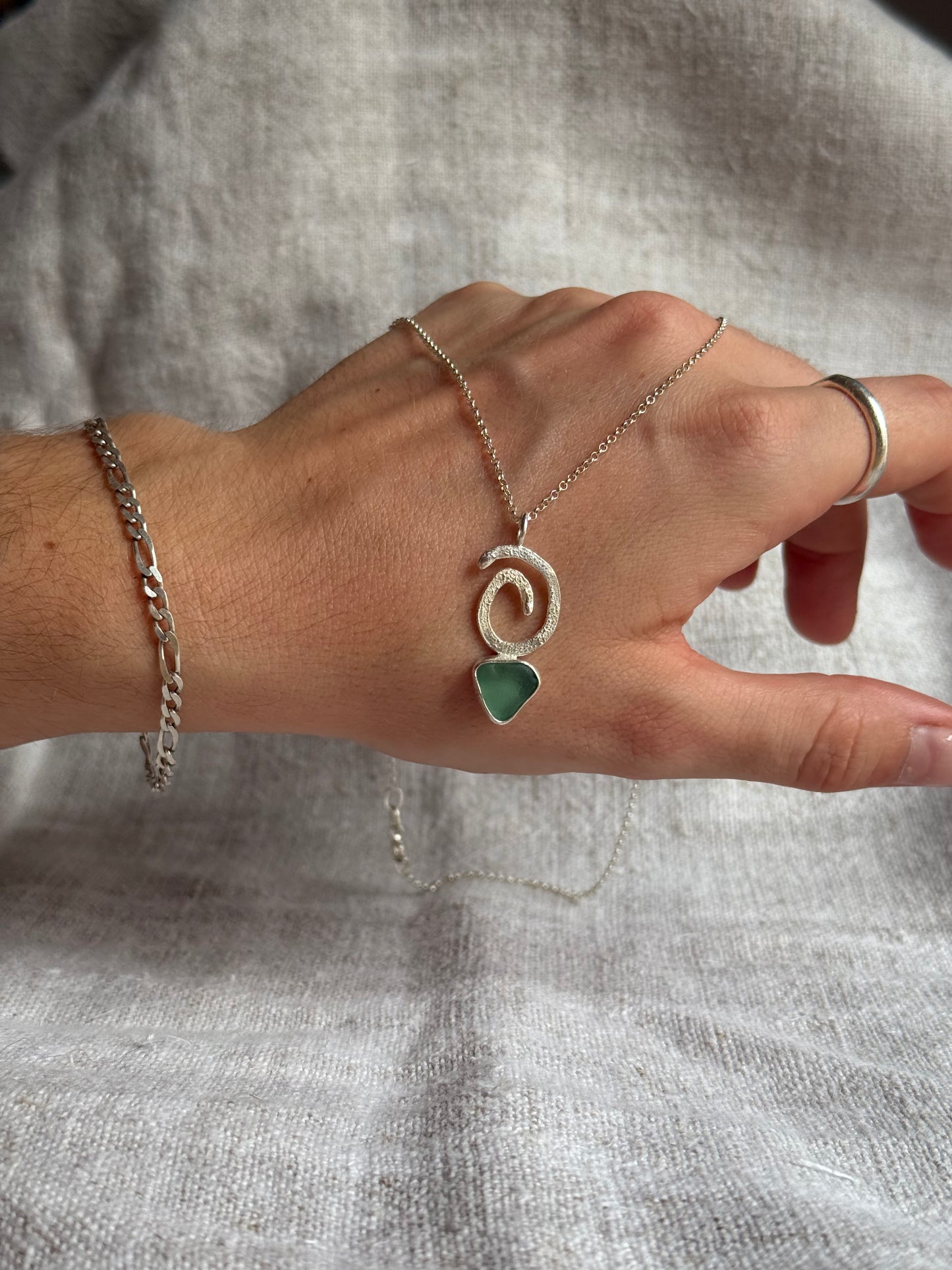 tide spiral pendant