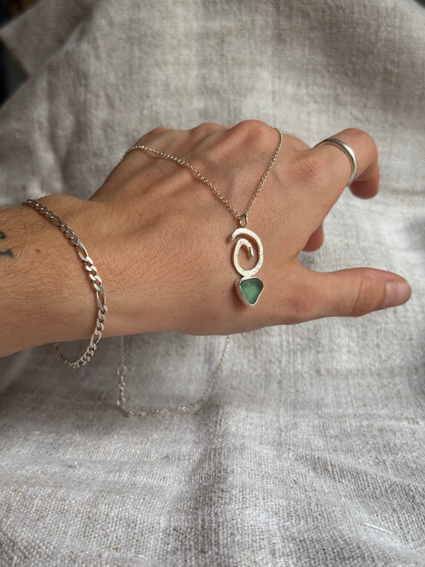 tide spiral pendant